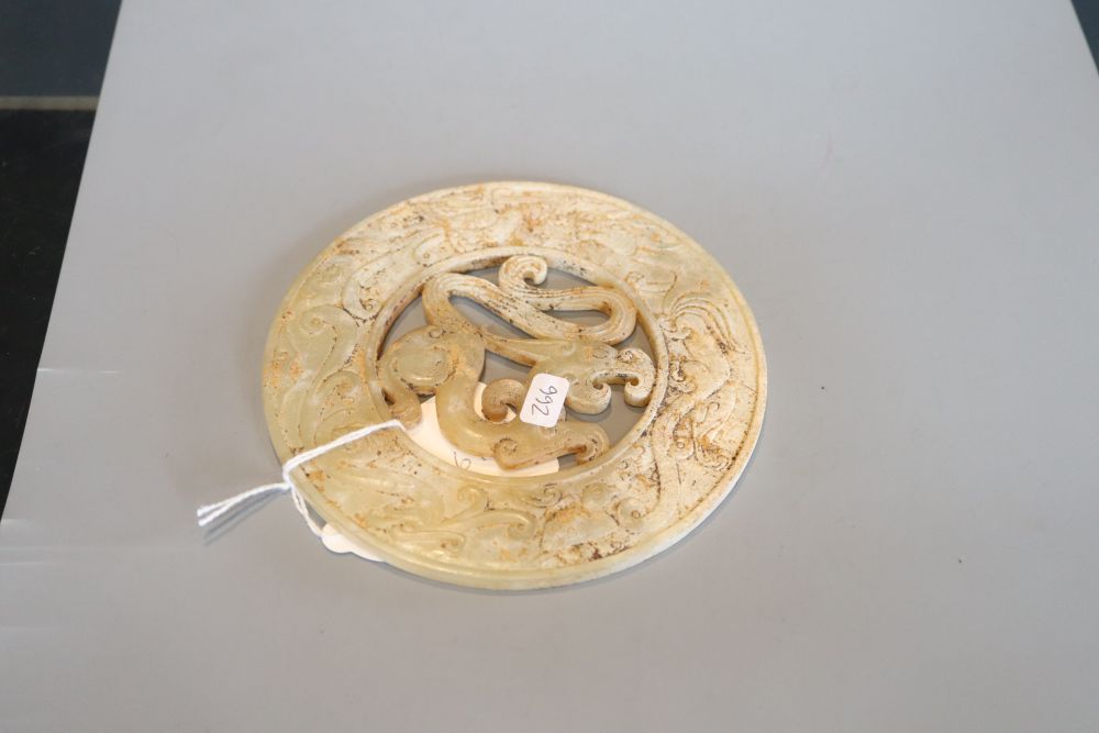 A Chinese yellow hardstone disc